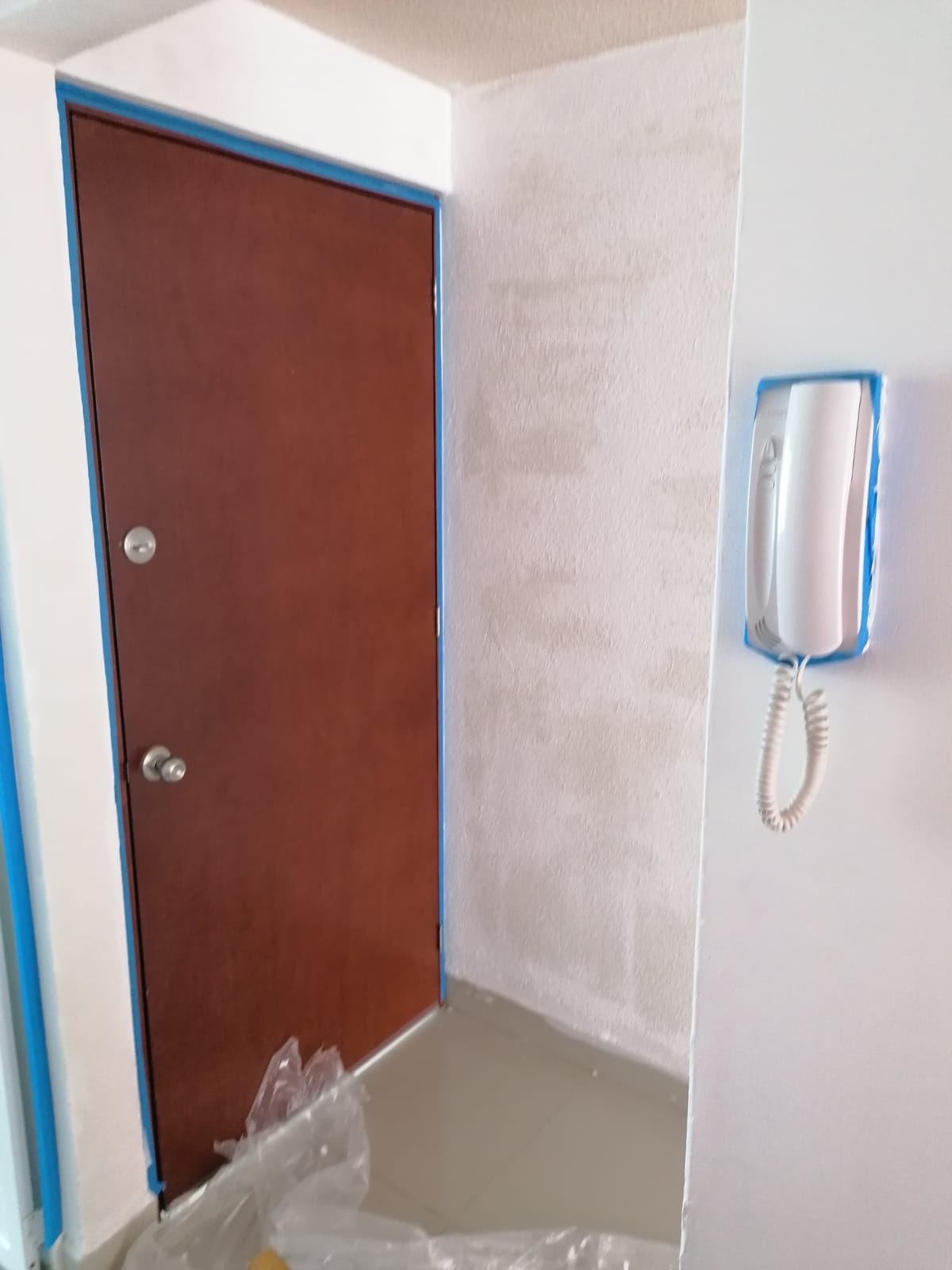 Proyecto Galek: entrada departamento remodelada