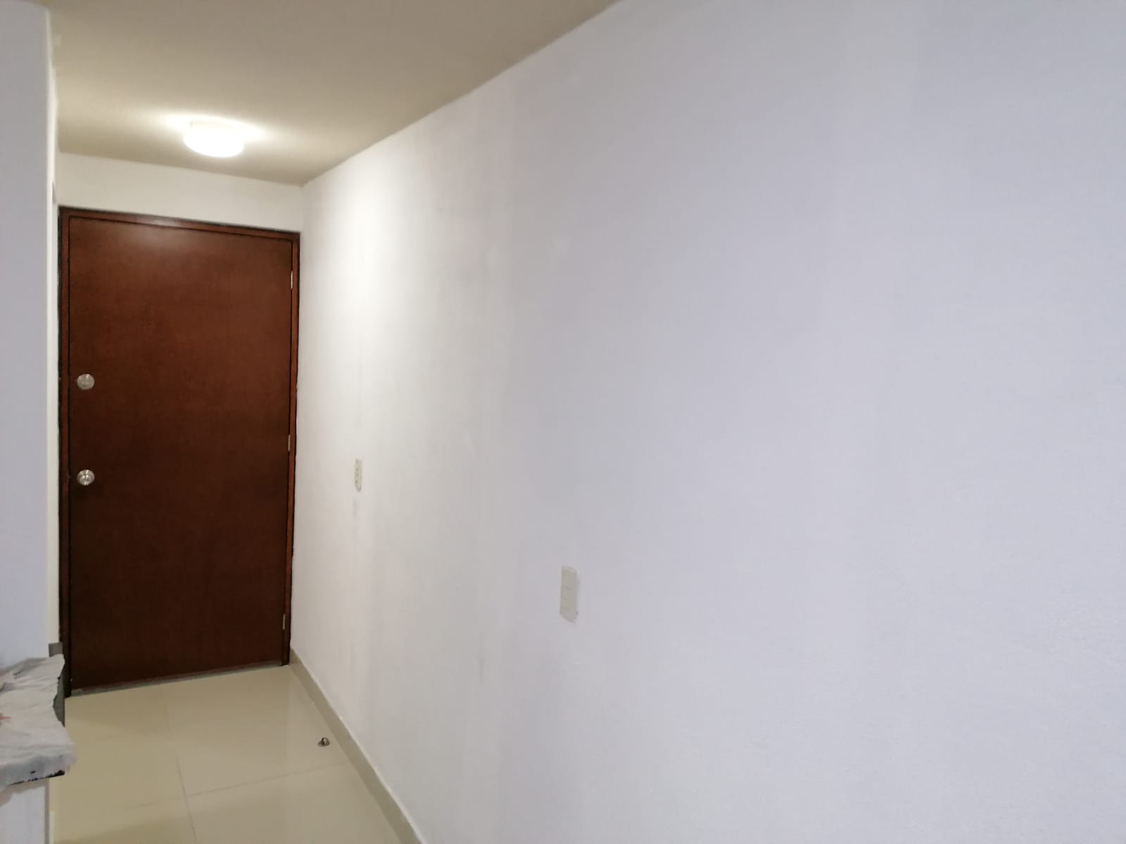 Proyecto Galek: pasillo departamento terminado